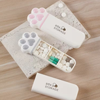 Organizador de pastillas en forma de mini patita de gato